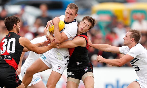 AFL 2017 JLT Community Series - Geelong Cats v Essendon Play on: Umps paid fewer free kicks for high contact during the pre-season comp - ${keywords}